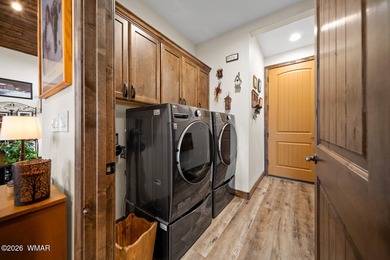 Nestled among towering ponderosa pines on two lots in the - photo 37