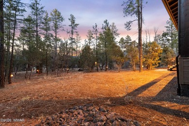 Nestled among towering ponderosa pines on two lots in the - photo 48