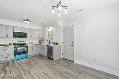 This beautifully updated 4-bedroom, 2-bath home offers almost - photo 9