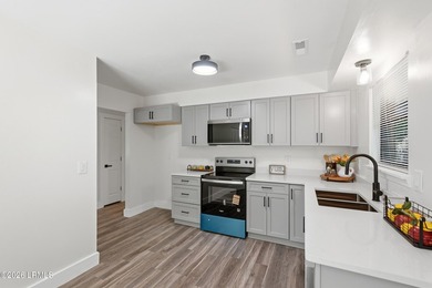 This beautifully updated 4-bedroom, 2-bath home offers almost - photo 10