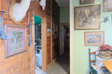 Located in Marion, this charming farmhouse sits on 25.7 acres of