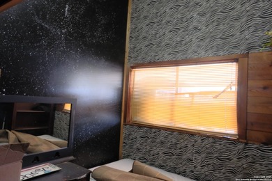 Located in Marion, this charming farmhouse sits on 25.7 acres of