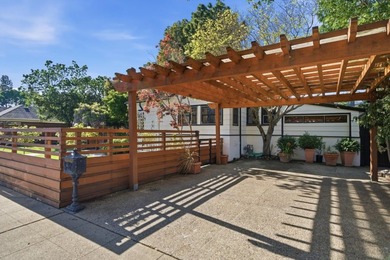 Tucked in the desirable Baywood neighborhood of San Mateo, this - photo 11