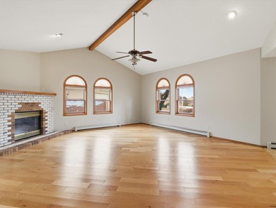 Situated on a .38 acre lot in the Sandia Foothills, this home is