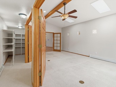 Situated on a .38 acre lot in the Sandia Foothills, this home is