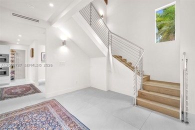 Exceptional fully renovated two-story residence featuring a - photo 12