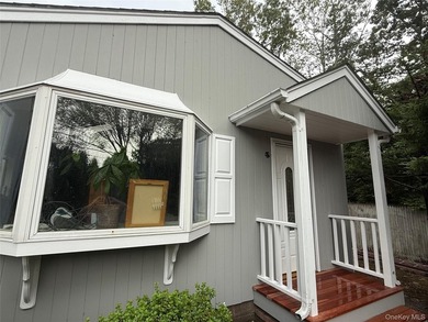 This 0.34-acre property features a 1.5-story clean 3-bedroom - photo 1