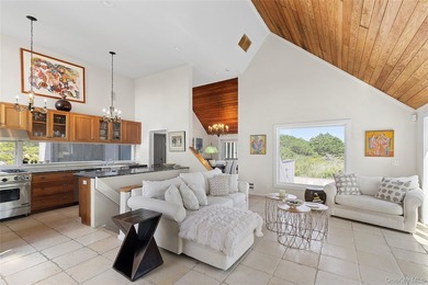 Set on 0.69 acres, bordering a two-acre dune preserve, this - photo 3