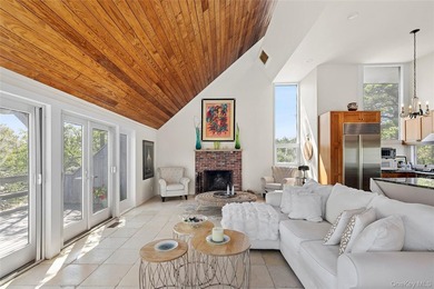 Set on 0.69 acres, bordering a two-acre dune preserve, this - photo 4