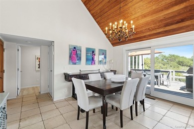 Set on 0.69 acres, bordering a two-acre dune preserve, this - photo 7