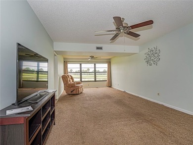 Enjoy stunning lake and golf course views in this 1,188 sq ft - photo 7