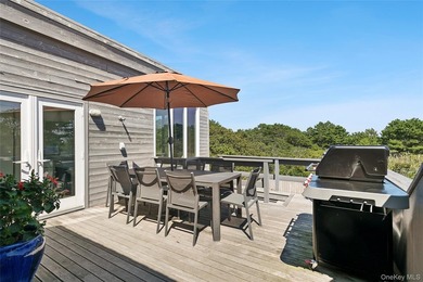 Set on 0.69 acres, bordering a two-acre dune preserve, this - photo 8