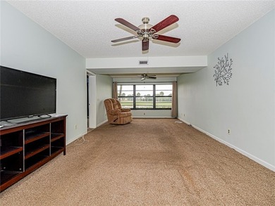 Enjoy stunning lake and golf course views in this 1,188 sq ft - photo 8