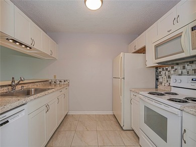 Enjoy stunning lake and golf course views in this 1,188 sq ft - photo 10