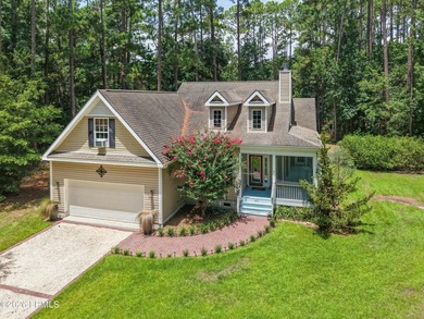 Nestled in the highly desirable Royal Pines community of - photo 1