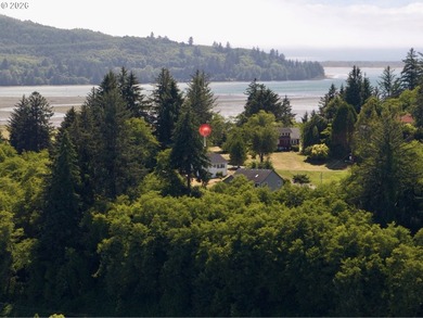 Perched above charming downtown Nehalem, this remodeled coastal - photo 2