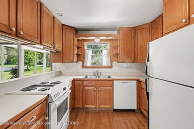 Tucked into East Lansing's beloved Pinecrest neighborhood, this - photo 4