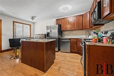 Beautifully redone 2 family house. Nothing to do but move in - photo 7