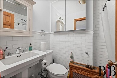 Beautifully redone 2 family house. Nothing to do but move in - photo 9