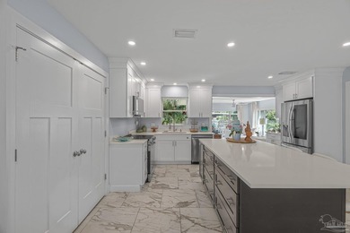 Enjoy coastal living in this well-maintained, fully renovated - photo 14