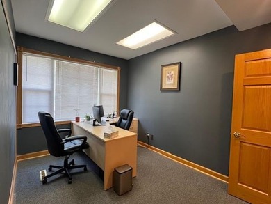 The main level offers 1,365 square feet, providing four offices - photo 13