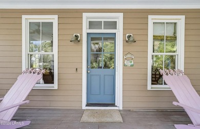 Welcome to 5 Clark St! This custom built golf cottage sits - photo 4