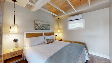 Welcome to this rare, income-producing waterfront retreat in - photo 16