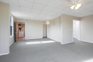 The main level offers 1,365 square feet, providing four offices - photo 19