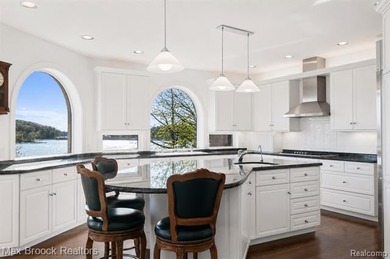 Perched above the shoreline with sweeping, unobstructed views - photo 21
