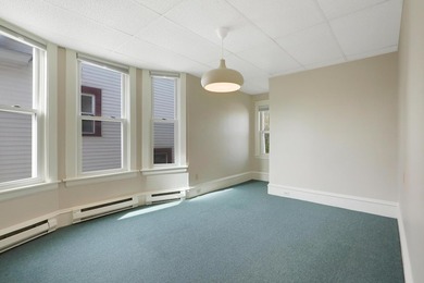 The main level offers 1,365 square feet, providing four offices - photo 22