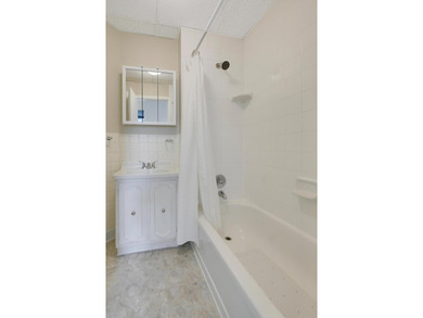 The main level offers 1,365 square feet, providing four offices - photo 23