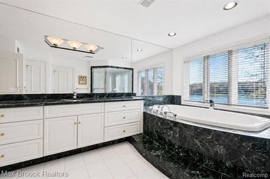 Perched above the shoreline with sweeping, unobstructed views - photo 40