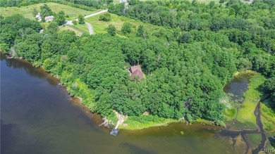 Truly one-of-a-kind dream waterfront home tucked away in the - photo 1
