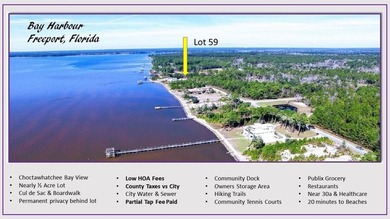 VIEW OF CHOCTAWHATCHEE BAY! DO NOT MISS THIS HALF ACRE lot on a - photo 5