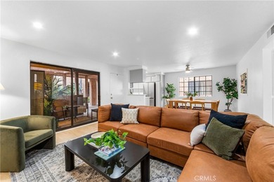 Welcome to this fully renovated 2-bedroom, 2-bath en-suite condo - photo 1