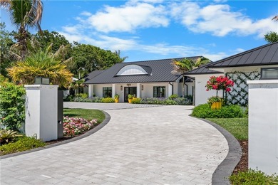 Exquisite Riomar Bay waterfront estate with 120' of sweeping - photo 2