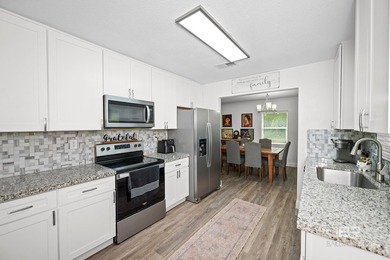 Beautifully remodeled home on 1.7 private acres with no HOA and - photo 6