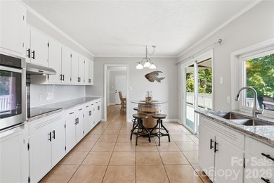 Live the ultimate lakefront lifestyle in this stunning, updated - photo 12