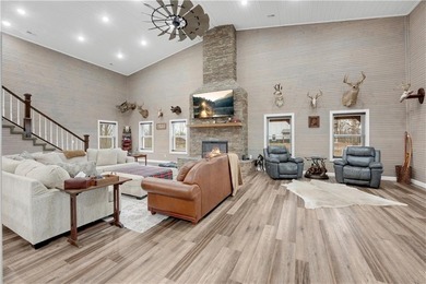 This expansive residence in Warsaw, MO, offers a harmonious - photo 2