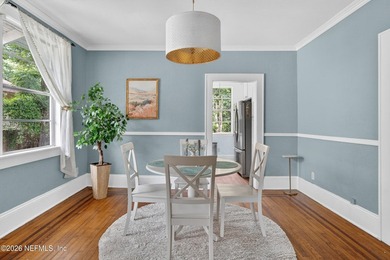 Historic Riverside charm meets modern efficiency in this - photo 12