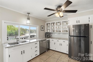 Live the ultimate lakefront lifestyle in this stunning, updated - photo 13