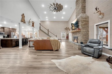 This expansive residence in Warsaw, MO, offers a harmonious - photo 4