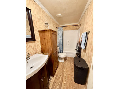 Welcome to 5+ private acres in New Ellenton! This spacious 3