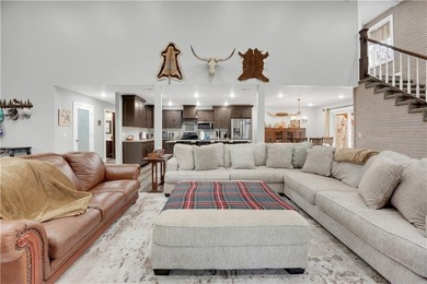 This expansive residence in Warsaw, MO, offers a harmonious - photo 7