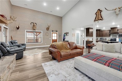 This expansive residence in Warsaw, MO, offers a harmonious - photo 8