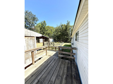 Welcome to 5+ private acres in New Ellenton! This spacious 3