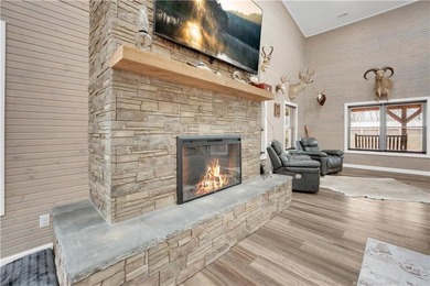 This expansive residence in Warsaw, MO, offers a harmonious - photo 9