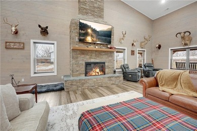 This expansive residence in Warsaw, MO, offers a harmonious - photo 10