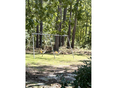 Welcome to 5+ private acres in New Ellenton! This spacious 3