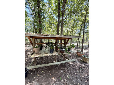 Welcome to 5+ private acres in New Ellenton! This spacious 3